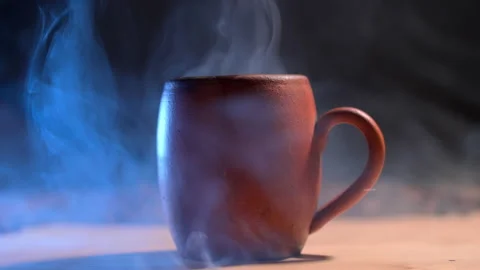 Aromatic coffee. beautiful ceramic mug with falling sugar cubes Stock Footage 170870676