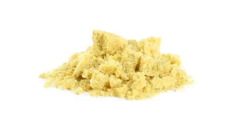 Aromatic crumbled bouillon cube on white background Stock Photos
