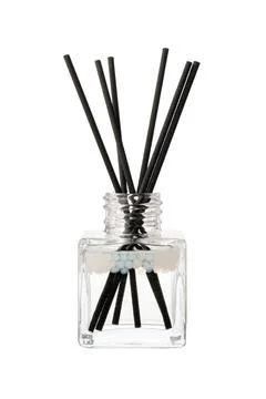 Aromatic diffuser bottle with sticks isolated on white background Foto stock