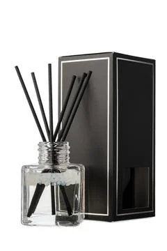 Aromatic diffuser bottle with sticks isolated on white background Foto stock