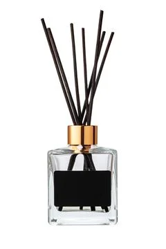 Aromatic diffuser bottle with sticks isolated on white background Foto stock