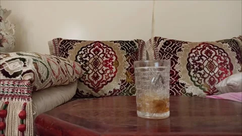 Aromatic Experience of Fresh Moroccan Mint Tea in Traditional Setting Stock Footage 333502615