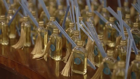 Aromatic reed diffusers with tassels on display Video stock 306756871