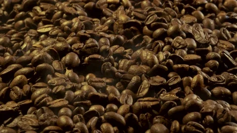 Aromatic smoke comes out from roasting coffee. Stock Footage 168314231