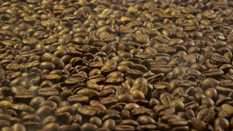 Aromatic smoke comes out from roasting coffee. Stock Footage 169055910