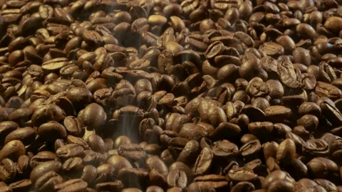 Aromatic smoke comes out from roasting coffee. Stock Footage 169750474