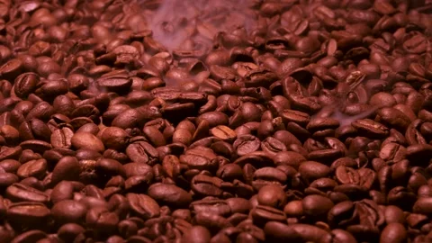 Aromatic smoke comes out from roasting coffee. Stock Footage 170759040