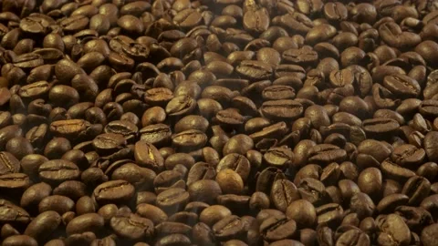 Aromatic smoke comes out from roasting coffee. Stock Footage 172094308