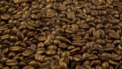 Aromatic smoke comes out from roasting coffee. Stock Footage 172274624
