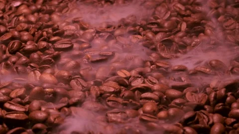 Aromatic smoke comes out from roasting coffee. Stock Footage 179770220
