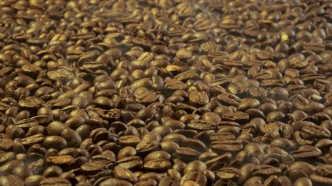 Aromatic smoke comes out from roasting coffee. Stock Footage 184842864