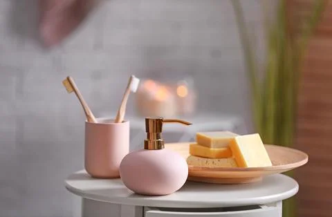 Aromatic soap and shampoo on table against blurred background. Space for text 스톡 사진