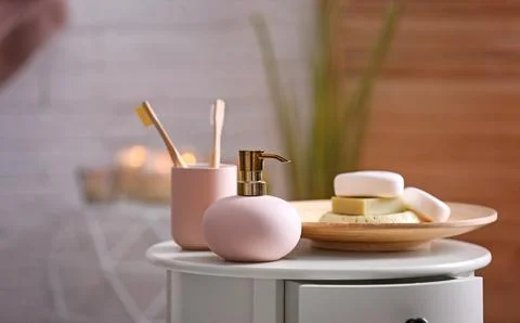 Aromatic soap and shampoo on table against blurred background. Space for text 스톡 사진