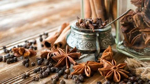 Aromatic spices on a rustic background. Stock Photos