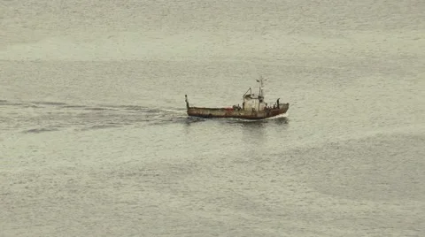Around the Bay slowly sailing a small ship. Stock Footage 68447320
