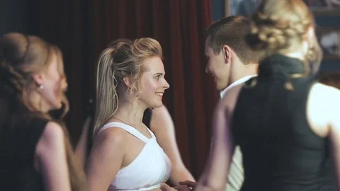 Around the couple and guests dance in a circle Stock Footage 74358010
