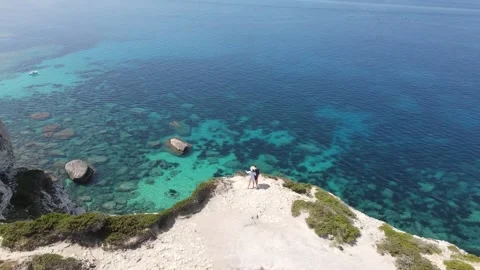 Around a couple on Bonifacio's cliffs Stock Footage 138323893