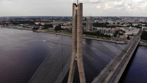Around drone shot, Vanšu Bridge, the Daugava River in Riga, Latvia Stock Footage 199596899