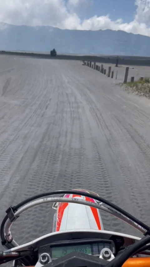 Around Mount Bromo using a trail motorbike Video stock 243357278