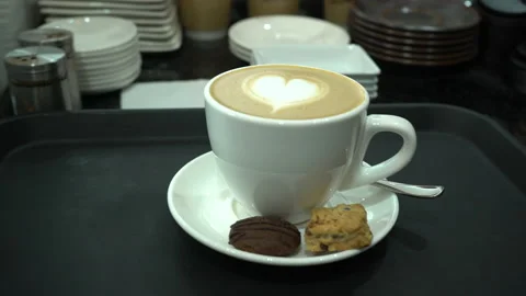 Around a prepared cup of coffee Stock Footage 229859630