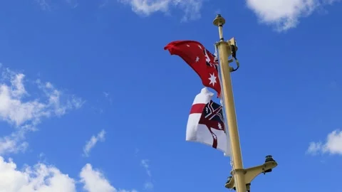 Around waving Sydney Ferries flag and Australian Red Ensign flag as 4k. Stock Footage 185999899