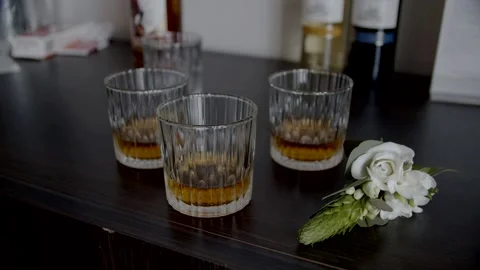 Around the whiskey glasses. Stock Footage 166703894