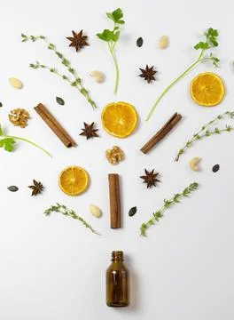 Arrange like a tree shape, Bottle of essential oil with fresh herbal sage,cit Stock Photos