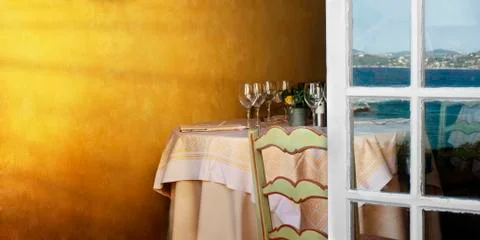 Arranged table in a restaurant and open window Stock Illustration