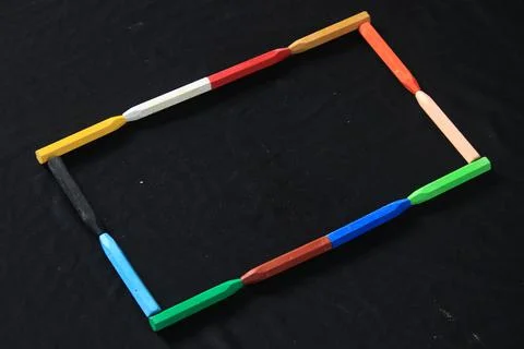 The arrangement of crayons forms an artistic space Stock Photos