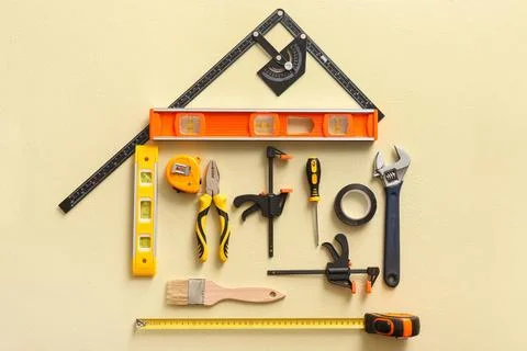 Arrangement of different construction tools on color background Stock Photos