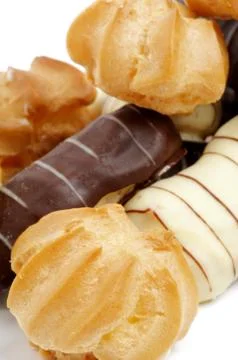Arrangement of Eclair and Profiterole Stock Photos
