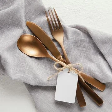 Arrangement elegant tableware with empty tag 스톡 사진