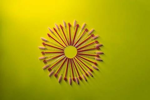 Arrangement of multiple brow brushes on a bright green background showing t.. Stock Photos