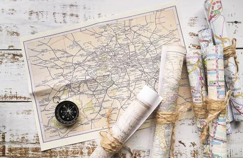 Arrangement old new type maps. High quality photo Stock Photos