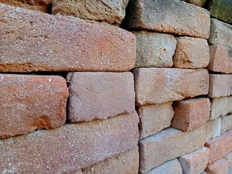 The arrangement of red bricks from the side angle is used to make a building 写真素材