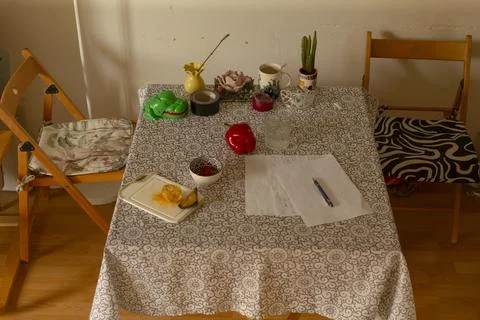 Arrangement of study materials with morning refreshment essentials Stock Photos