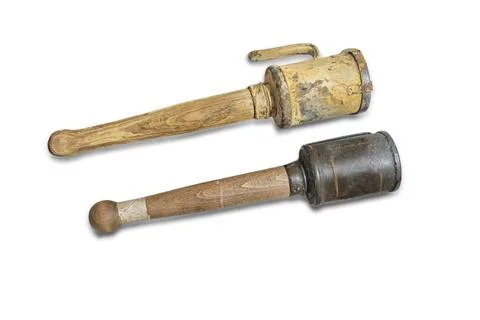 Arrangement of three historical objects on a light background wooden tool, me Stock Photos