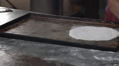 Arranging Chapatis and adding sweeteners and flavouring in the mix Stock Footage 112878363