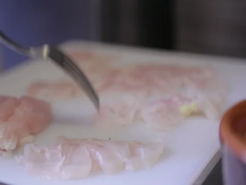 Arranging chicken fillets Stock Footage 80679114