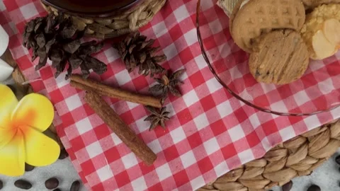 Arranging Coffee Beans with Cinnamon Stick and Flower Flat Lay Stock Footage 313255978