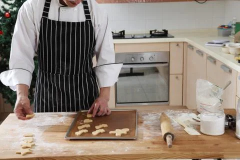 Arranging cookies Stock Photos