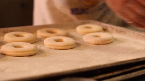 Arranging donuts for subsequent frying - 02 스톡 동영상 130086870