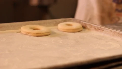 Arranging donuts for subsequent frying - 03 스톡 동영상 130086877
