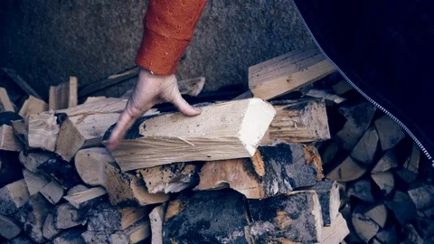 Arranging firewood Stock Footage 99429152