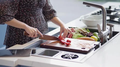 Arranging fresh ingredients in a kitchen tray Stock Footage 336466252