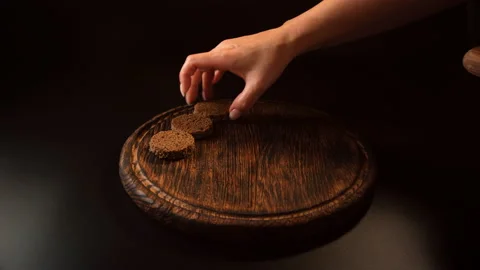 Arranging slices of bread and sliced cucumbers on a tray Video stock 148634882