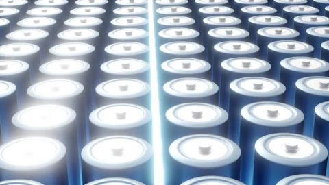 An array of 3d metallic blue cylindrical battery cells Видео 344636568