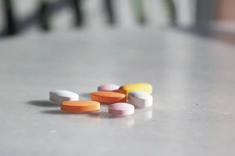 An Array of Assorted Vitamins and Medications on table Foto stock