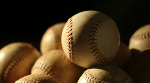 An array of baseballs on a field. Stock Footage 68823572