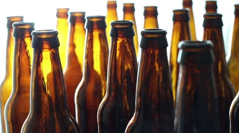 An array of beer bottles with a white background. Stock Footage 68796967